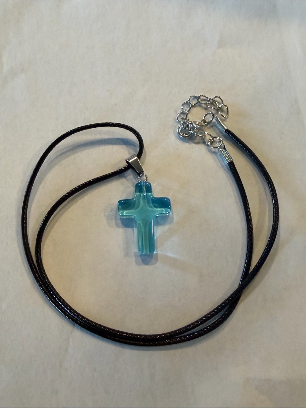 Glass Cross Necklace in Aqua Blue on Black Cord
